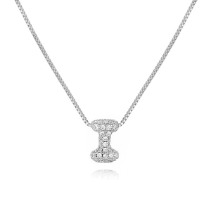 Macro shot of silver paved letter I pendant with beads on a clean white background