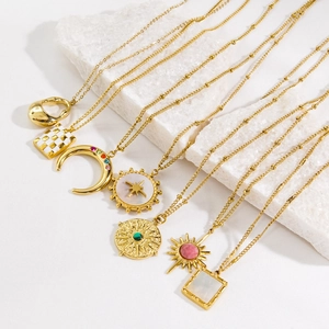 Luxurious 14k gold plated stainless steel necklaces featuring natural stone and shell charms