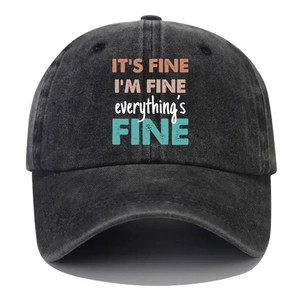 Close-up of printed slogan on washed dark grey cotton baseball cap with curved brim