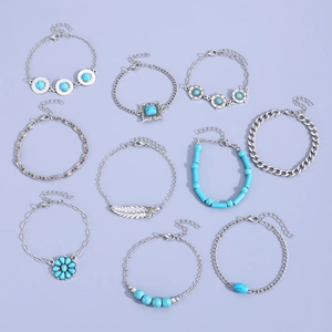 Detailed flat lay of 10-piece boho silver alloy bracelets with turquoise stone patterns