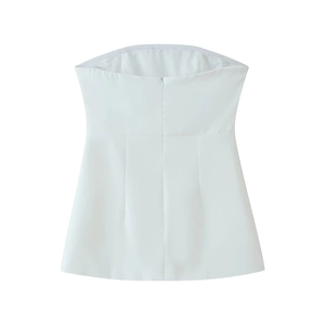 Detail of white strapless top featuring elastic waist and high-quality fabric texture
