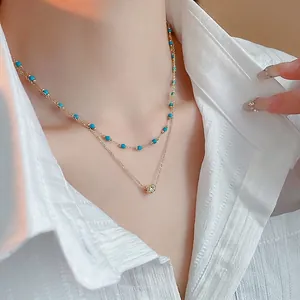 Double-layer bohemian necklace with gold plating and sky blue beaded turquoise accents