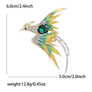 Detail view of phoenix brooch with dimensions 6.0cm x 5.0cm and weight 12.8g