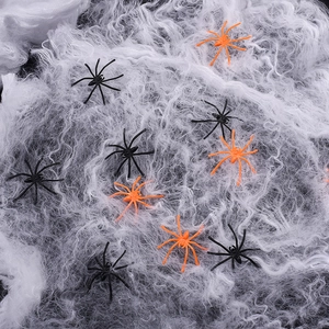 Halloween cobweb set with white cotton webbing and small black and orange plastic spiders