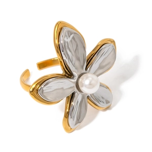 Minimalist stainless steel flower ring with pearl accent and two-tone adjustable band