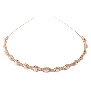Elegant gold headband with white pearls and sparkling rhinestones for women hair styling