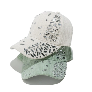 Velvet baseball caps with heavy rhinestones in cream white and sage green