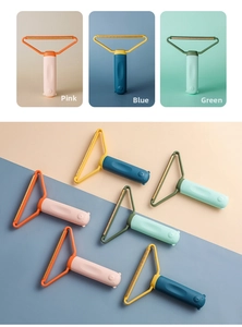 Detail of portable T-shape manual lint remover with cute bear handle in various colors