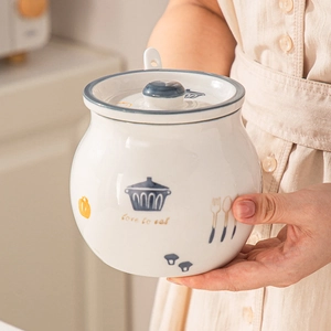Ceramic lard jar with lid and spoon featuring colorful cartoon kitchen patterns