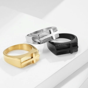 Cross signet rings in gold, silver and black stainless steel with sunburst texture