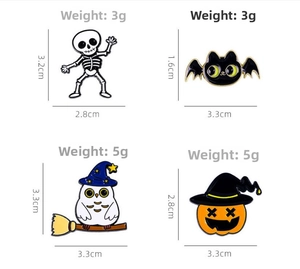 Detail of Halloween enamel pins set showing size and weight for pumpkin and ghost badges