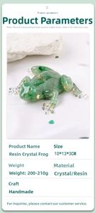 Detailed view of handmade green resin frog ornament with crystal chips and gold foil