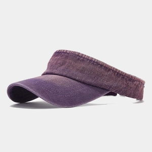 Detailed side view of washed vintage purple denim sun visor with textured fabric