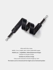 Detail of black crocodile texture bag strap with silver metal swivel hooks, 4.1cm wide