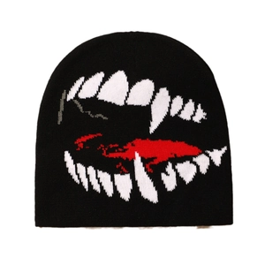 Black knit beanie featuring a bold white fangs and red tongue print, stylish and warm cap