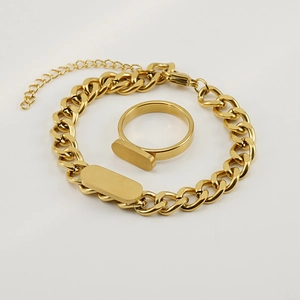 18K gold plated Cuban chain bracelet and ring set with rectangular charms on white background
