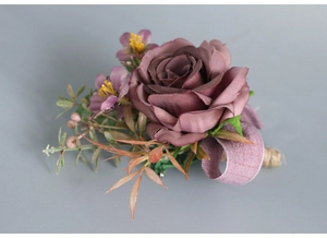Detail of dusty rose silk boutonniere with twine wrap and lavender ribbon decor