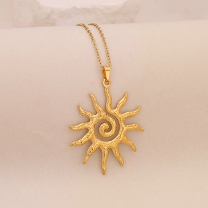 Minimalist stainless steel necklace featuring a creative golden sun pendant with spiral design