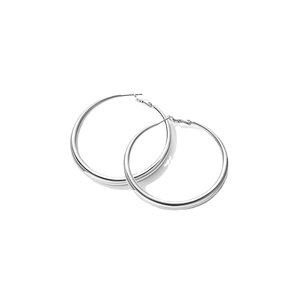 Minimalist oversized silver hoop earrings with sleek metallic texture on white background