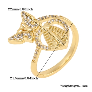 Macro view of gold butterfly ring with leaf zircon details and size dimensions
