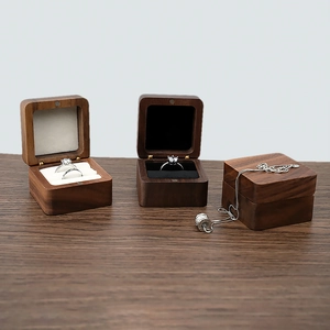 Three walnut wood jewelry boxes with black and white velvet lining for rings and studs