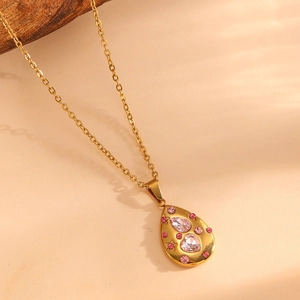 18K gold plated titanium necklace with heart-shaped pink crystals and water drop pendant