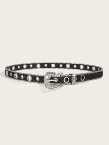 Detail of western style black glitter belt with silver metal studs and eyelets