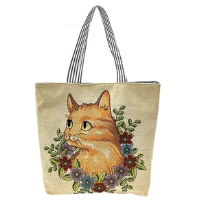 Canvas tote bag featuring exquisite cat and floral embroidery with striped handles