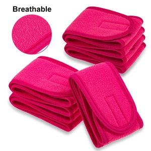 Macro view of breathable pink plush spa headband texture and velcro strap detail