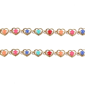 Golden stainless steel heart chain necklaces with colorful gemstones on a white background