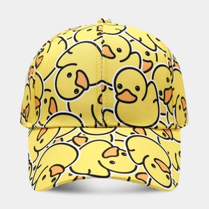 Yellow baseball cap featuring cartoon duck prints with a curved brim and cotton fabric