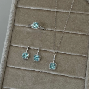 Elegant aquamarine pendant necklace, ring and earrings set in silver finish jewelry box
