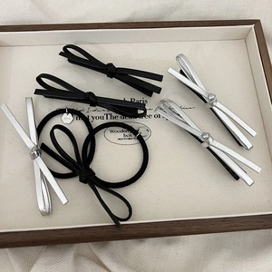 Set di fermagli per capelli vintage in pelle con fiocchi neri e argento e elastici