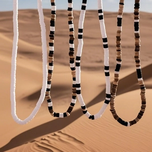 Men's 4-piece Bohemian clay beaded necklace set in white, black, and brown earth tones