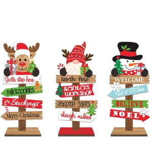 Three-piece wooden Christmas table signs featuring reindeer, gnome, and snowman designs