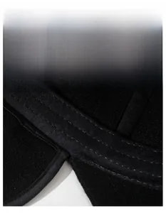 Close-up of moisture-wicking sweatband on black winter baseball cap with reinforced stitching