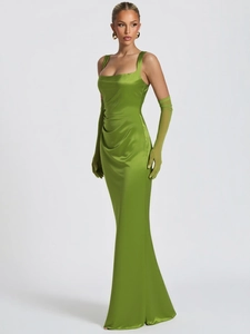 Elegant emerald green satin maxi dress with corseted bodice and matching sheer long gloves