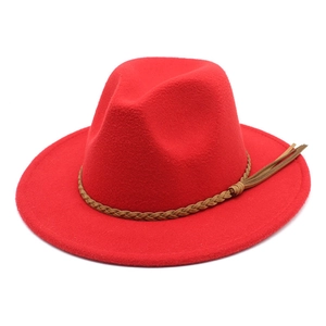 Detail of red fedora hat with high-density wool felt and brown braided tassel band