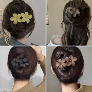 Collage of four matte flower hair clips in green, khaki, black and brown for women