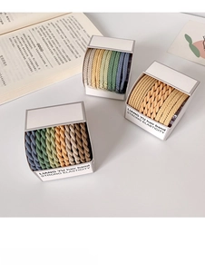 Flat lay of high elasticity braided hair ties set in assorted neutral Morandi colors