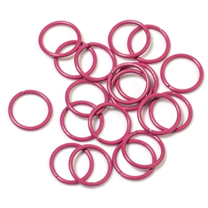 Pink macaron painted open jump rings for DIY jewelry making displayed on a white background