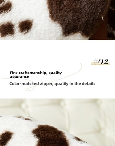 Close-up of cow print plush pillowcase showing texture and hidden zipper detail