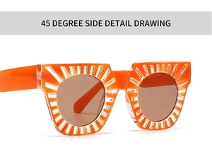 Detail view of bright orange sun-shaped frame sunglasses with brown lenses at 45-degree angle