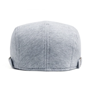Classic grey textured knit cotton flat cap with vertical stitching and side buckle detail