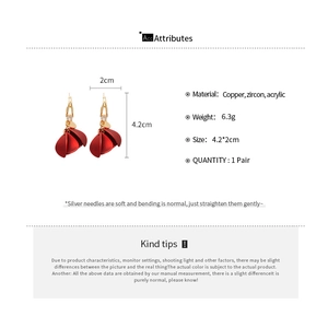 Detail view of acrylic zircon flower tassel earrings with size dimensions and specs