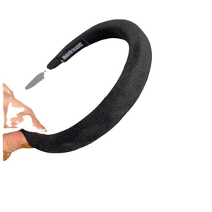 Thick black velvet headband with handmade label for elegant retro high crown styling