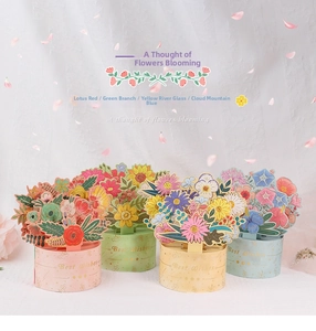 Set of four 3D floral paper ornaments with 'Best Wishes' text and elegant gold stamping