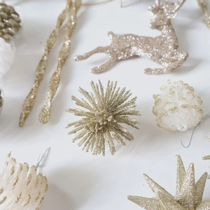 Champagne glitter Christmas ornaments set featuring reindeer, stars and pinecones