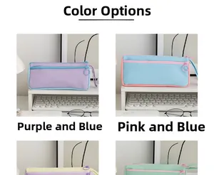 Detailed close-up of color-block canvas pencil cases with ring zippers on a desk