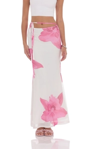 Detail of white mesh skirt with pink floral prints and adjustable waist tie belt
